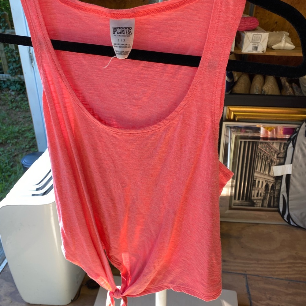 Victoria’s Secret PINK sleeveless top which has a tie at the bottom